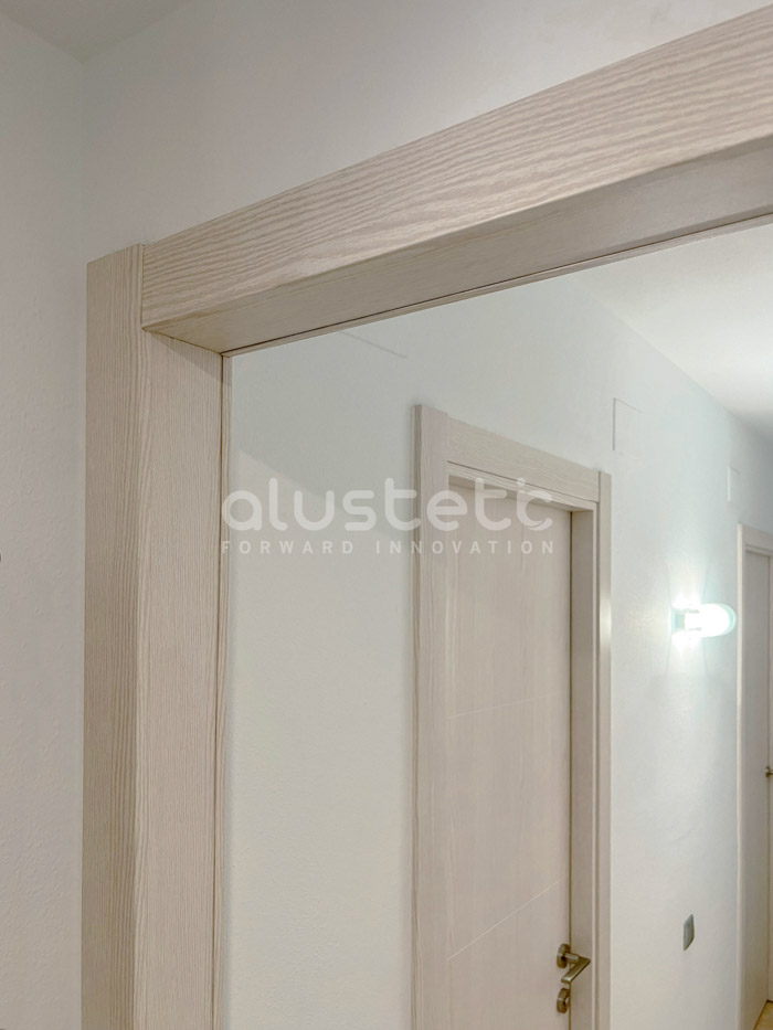 Detail of a white oak finish aluminium interior door